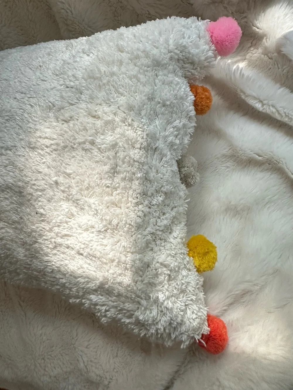 NWT Cozy Cream Sherpa Lumbar Pillow with Colorful Pom Trim